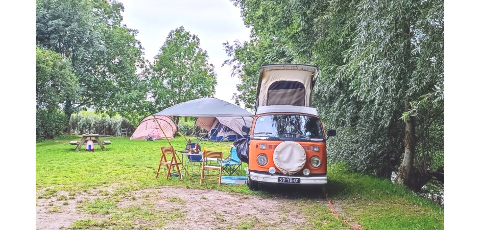 Old farmhouse on campsite along river