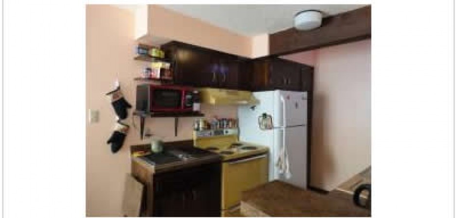 This large condo is located in a sm...