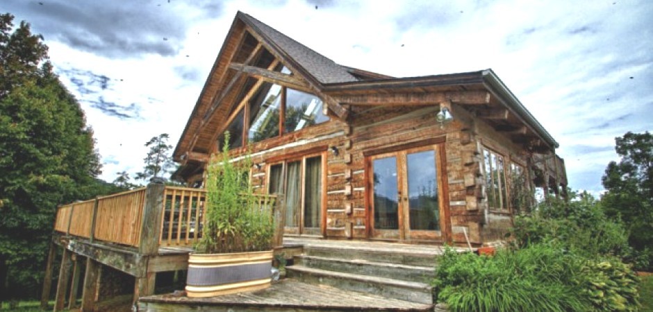 This secluded log cabin sits on top...