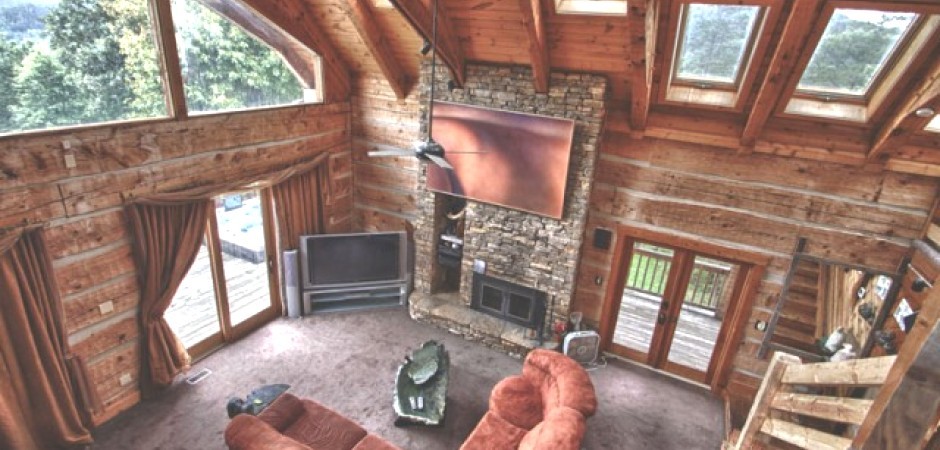 This secluded log cabin sits on top...